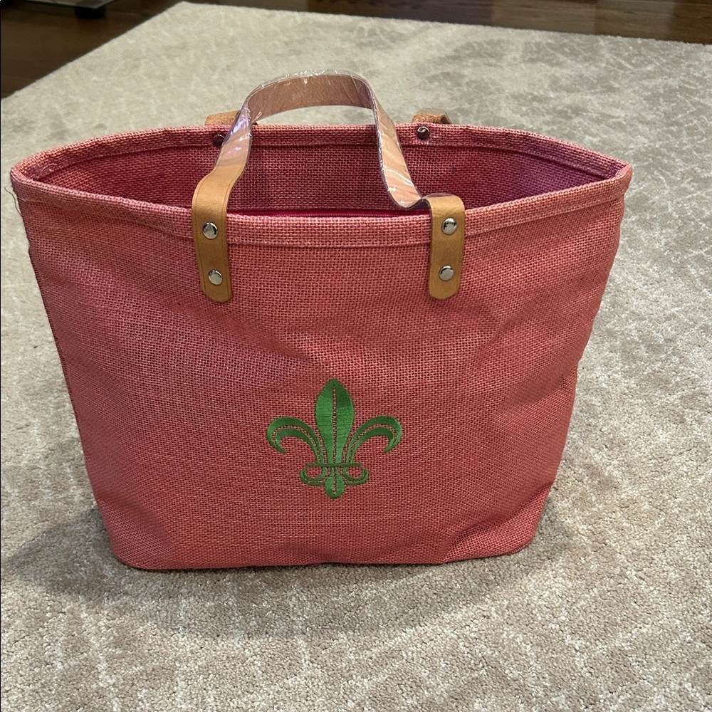 Stylish Pink Canvas Tote Bag with Green Fleur-de-Lis Accent